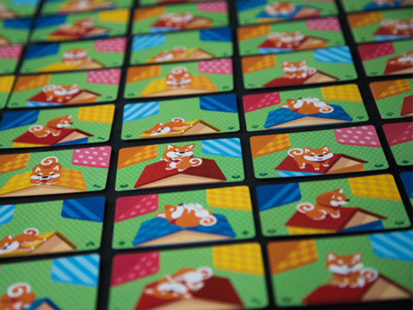 Shiba Inu House, the card game of fun colourful puzzles and quick reflexes.
